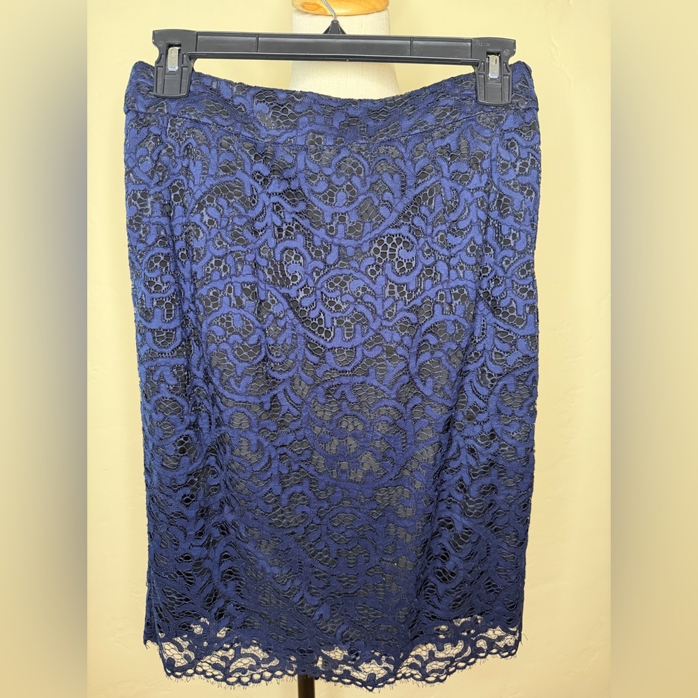Trina Turk Navy blue lace skirt with pockets & back slit. Lined in black. Size 2